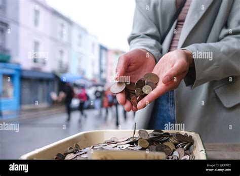 Dropping some coins into a plastic tray - sound effect