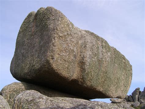 Rock: a large rock is rolling down the slope.   - sound effect