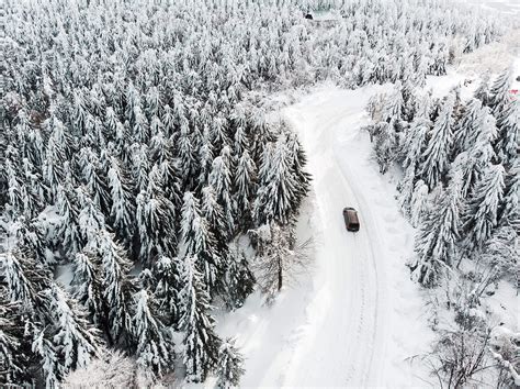 Car driving on a snowy road - sound effect