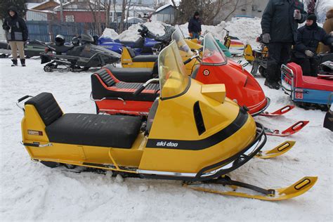 Several snowmobiles - sound effect
