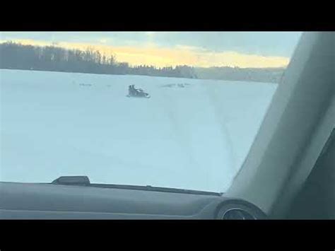 Snowmobile passing by - sound effect