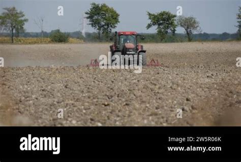 Tractor is approaching from afar and passing by - sound effect