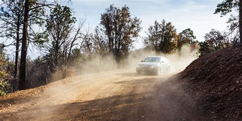 Driving a car on gravel, stones are tapping on the bottom - sound effect