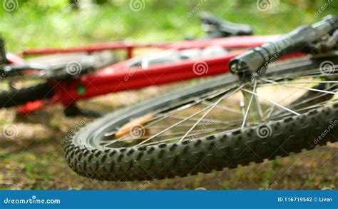 Wheel of an overturned bicycle is spinning - sound effect