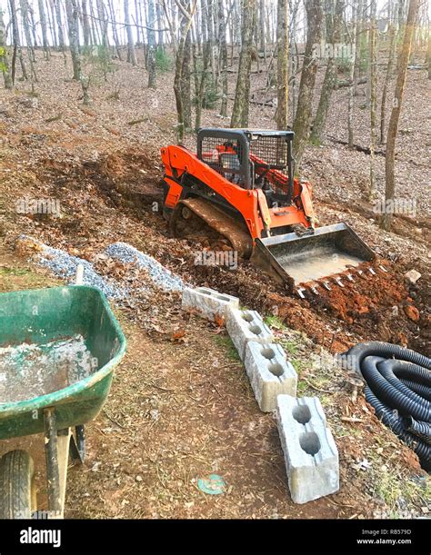 Bulldozer destroys a large stone wall - sound effect