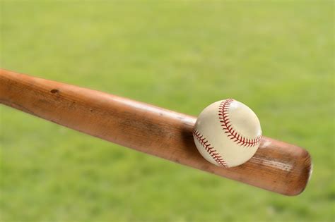 Hitting the ball with a wooden bat - sound effect