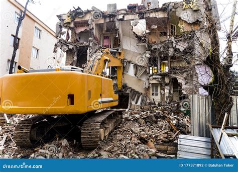Bulldozer destroys a small building - sound effect
