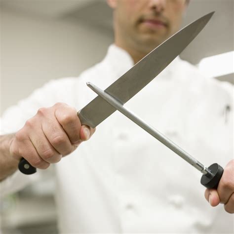 Cook works with a knife in the kitchen - sound effect