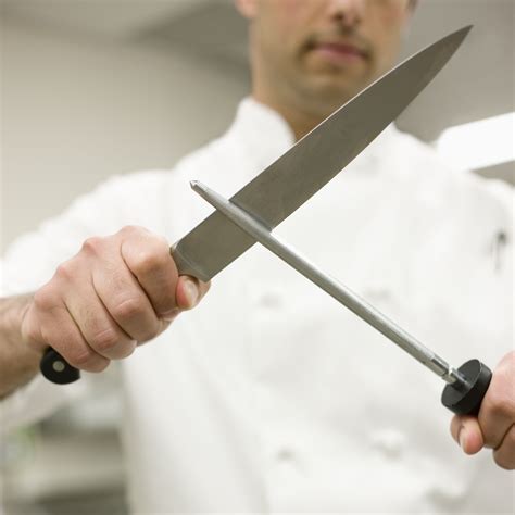 Cook works with a knife in the kitchen - sound effect