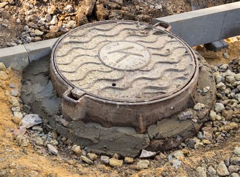 Sewer hatch is pushed back - sound effect
