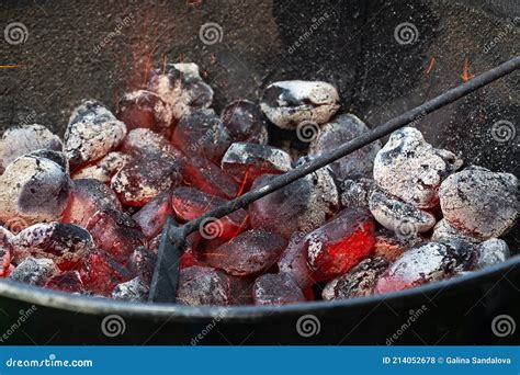 Stirring ash with a poker, coals - sound effect