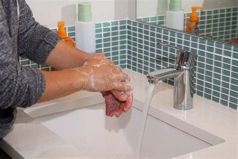Water runs into the sink, washing hands and face - sound effect
