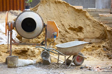 Cement is mixed in a concrete mixer - sound effect