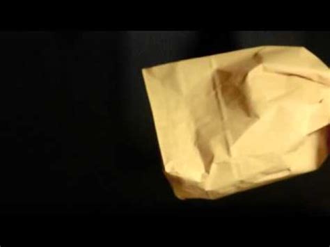 Inflating a paper bag and blowing it up - sound effect