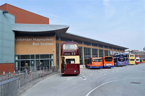 At the bus station: general atmosphere, loudspeaker announcements - sound effect