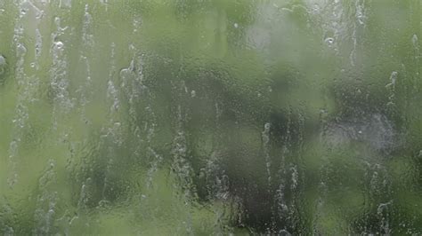 Heavy downpour pours on the glass - sound effect